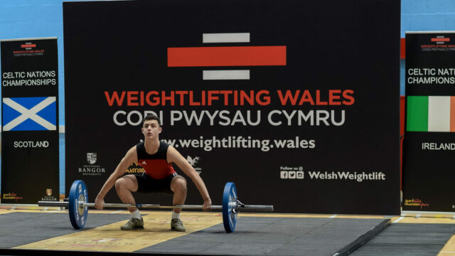 Youth Male lifter taking a Snatch attempt in competition